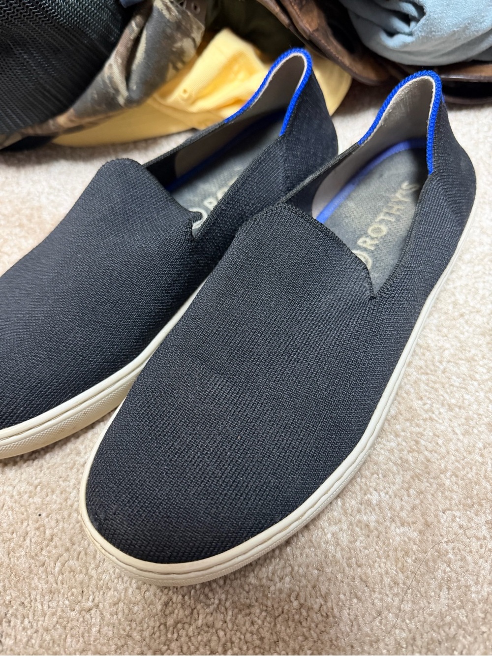 Rothy's Black Slip-On Loafers with Blue Trim